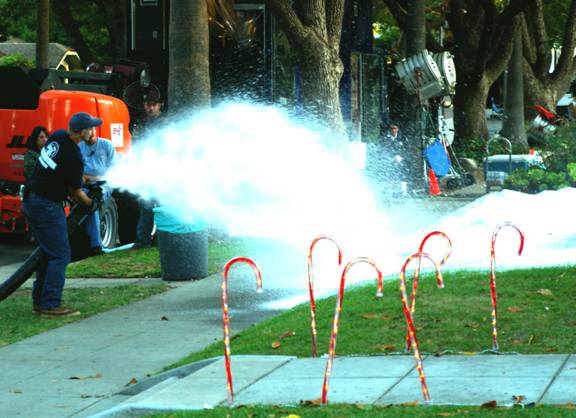 Shooting snow onto the yard for the scene